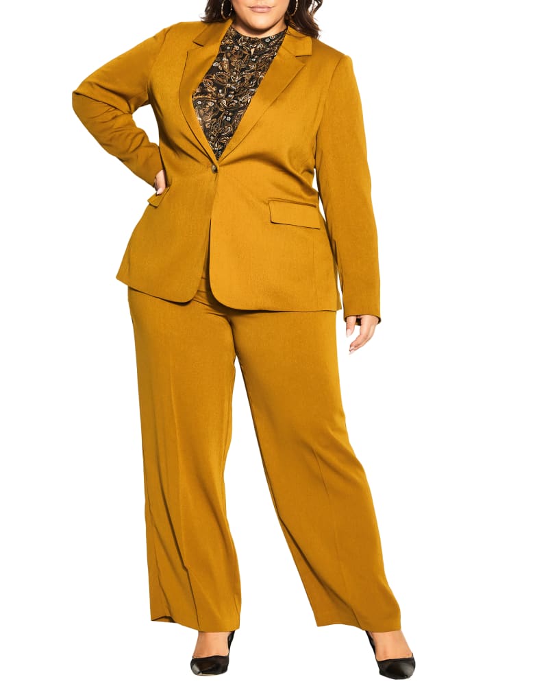 Front of a model wearing a size XS JKT CLARISSA in Dark Gold by City Chic. | dia_product_style_image_id:239972